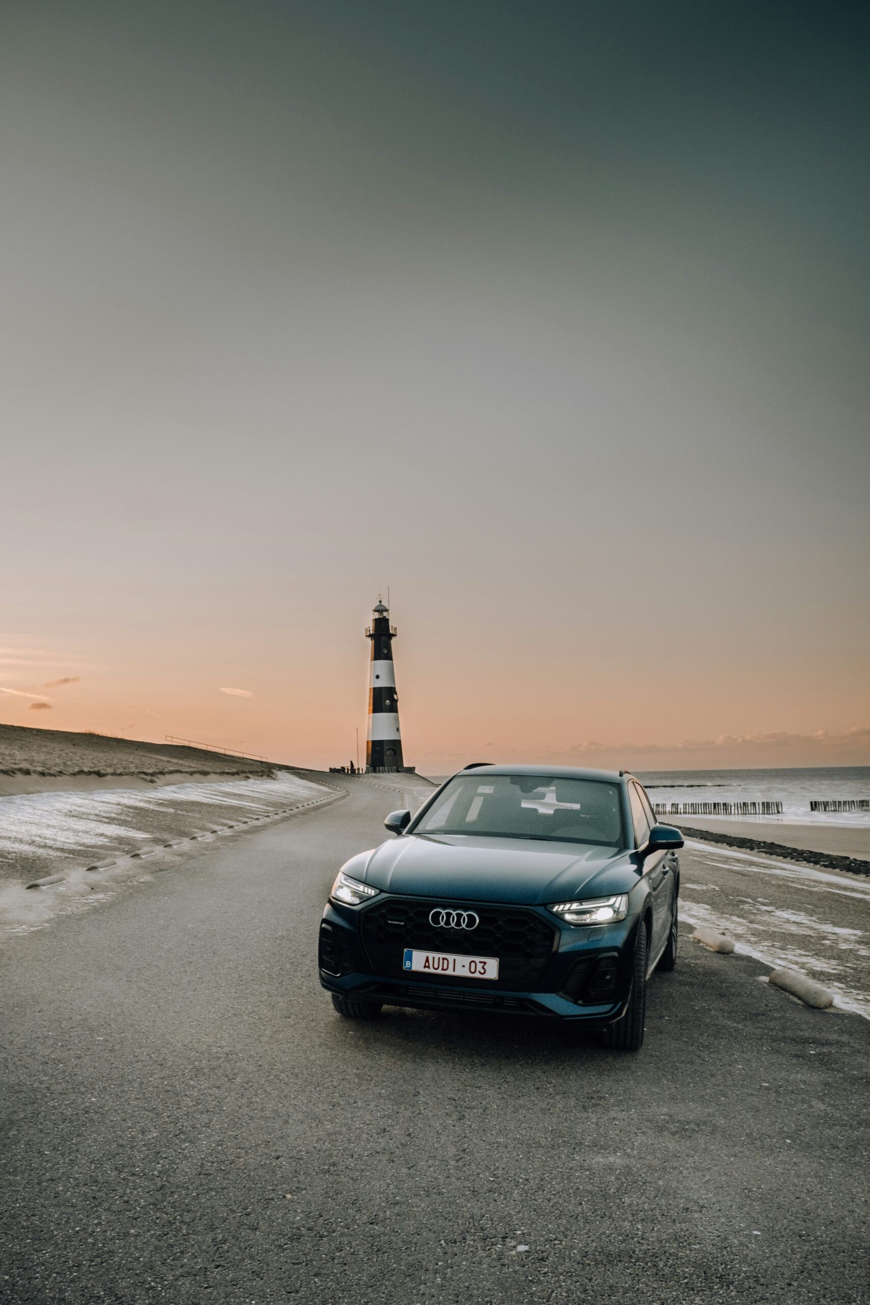 black audi a 4 on a beach